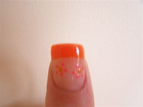 Nail art - bright orange tips with pink flower | here ive pa… | Flickr