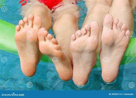 Children Feet In Water Stock Photo - Image: 49309114