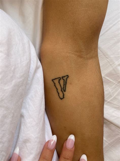 Vlone tattoo / A$AP rocky in 2022 | Pretty tattoos, Tattoos for guys ...