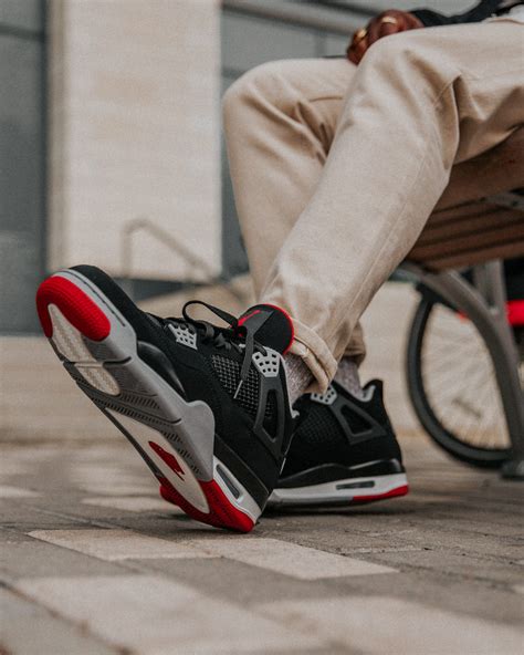 Here's How the 2019 Air Jordan 4 Black/Red Looks On Foot | Nice Kicks