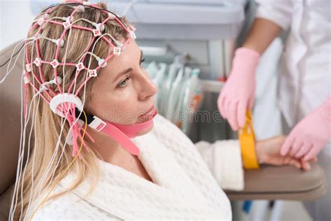 Diagnostician Prepares the Patient for Electroencephalogram Procedure Stock Photo - Image of ...