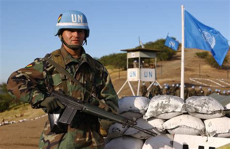 File:Bolivian Army 2nd Lt. Mauricio Vidangos stands guard at the entry control point of an ...