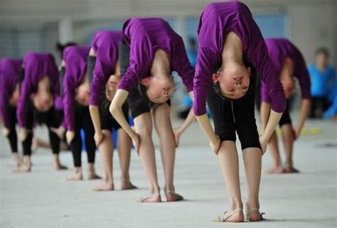 Chinese kids training in Gymnastics Brutal Training Pics - Neeshu.com