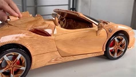 Watch: This Ferrari SF90 Spider wooden toy car has working steering ...