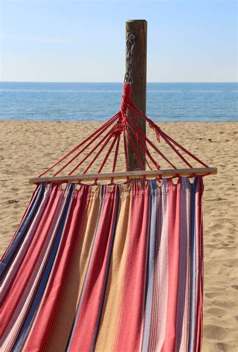 Hammock for Relaxing on the Beach by the Sea Stock Photo - Image of ...