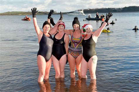 Boxing Day swim sees young and old plunge into the icy sea for charity ...