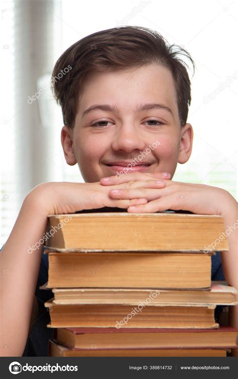 Boy Studing Table Blue Background Many Book Stock Photo by ©chepko 389814732