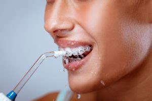 Which Is Better: Water Flossers Vs. String Floss - Hoffman Dental Care