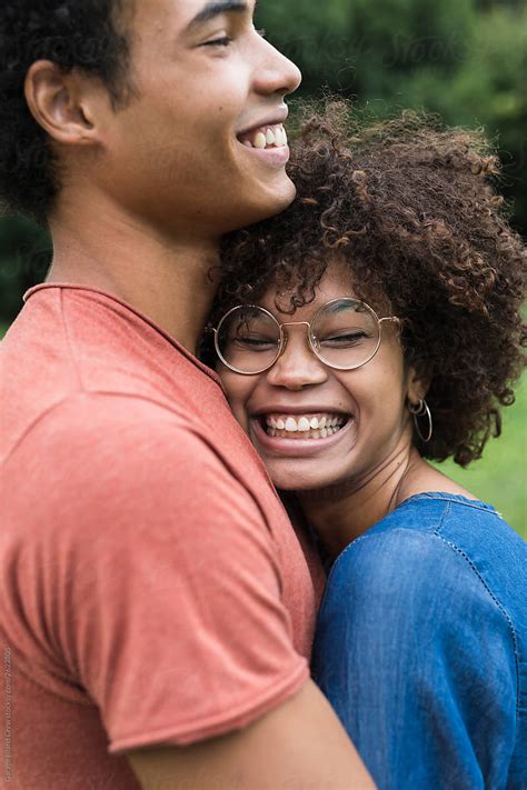 Happy young black couple in the park - Stock Image - Everypixel