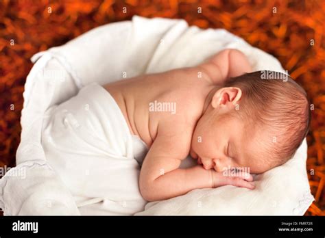 Little newborn baby boy sleeping Stock Photo - Alamy