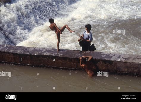 Boys and teenagers having fun in a river in the ancient town Feng Stock Photo: 63777696 - Alamy