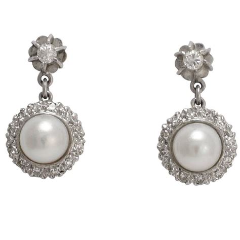 Art Deco Pearl and Diamond Cluster Stud Earrings at 1stDibs