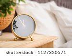 Free Image of Alarm clock on a wooden table | Freebie.Photography