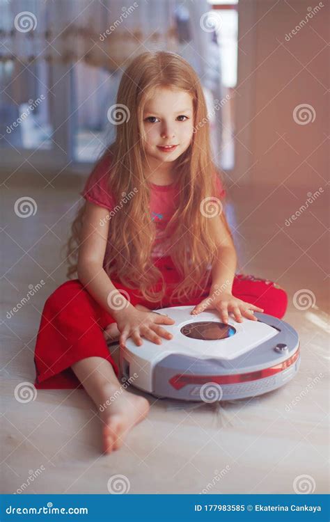 Kid with Robot Vacuum Cleaner Playing Stock Image - Image of automatic, floor: 177983585
