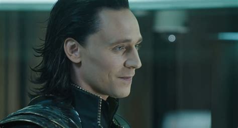 a really nice close-up Loki smirk (also, wallpaper album inside.) : tomhiddleston