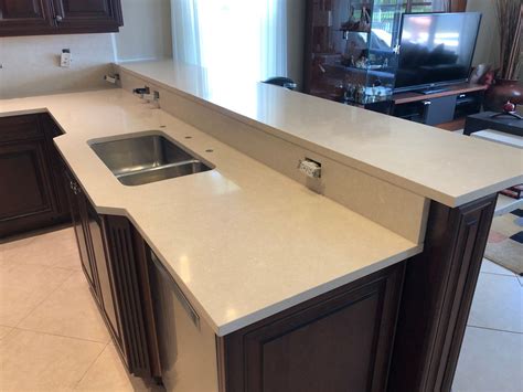 Creamy base Quartz Countertops installation | Cambria Fairbourne