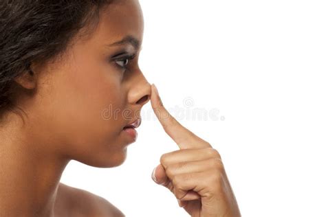 Woman touching her nose stock image. Image of touch - 101220643