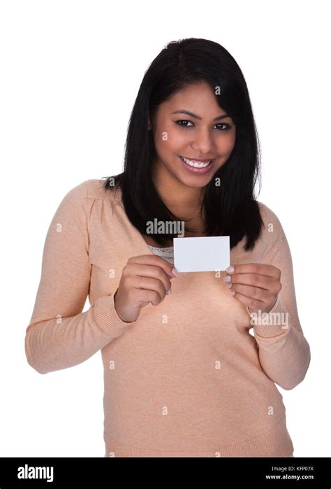 Young Woman Over White Background Showing Visiting Card Stock Photo - Alamy