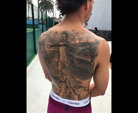 Leroy Sane tattoo: Manchester City star gets crazy ink of himself celebrating on his back ...