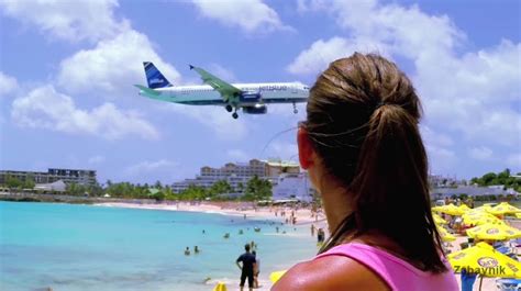 Sint Maarten airport landing & Girls top blown away on Maho beach by Jet blast takeoff St Martin ...