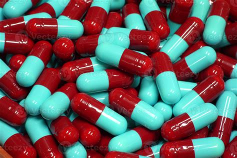 red and blue capsules close up 1262524 Stock Photo at Vecteezy