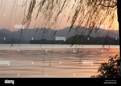 Sunset at West Lake Hangzhou China Stock Photo - Alamy