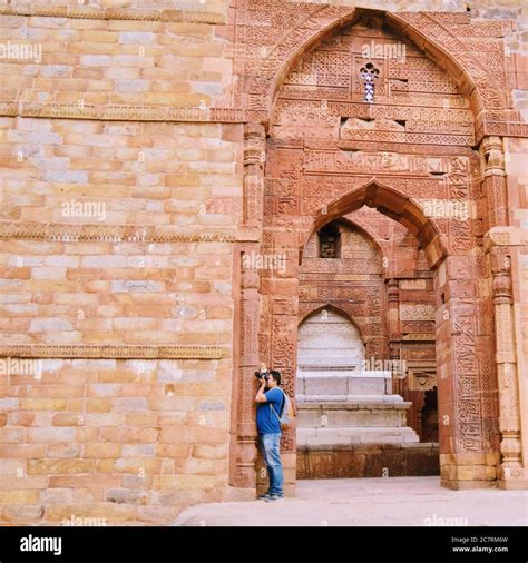 Inside the Qutub Minar Complex with antic ruins and inner square. UNESCO World Heritage in ...