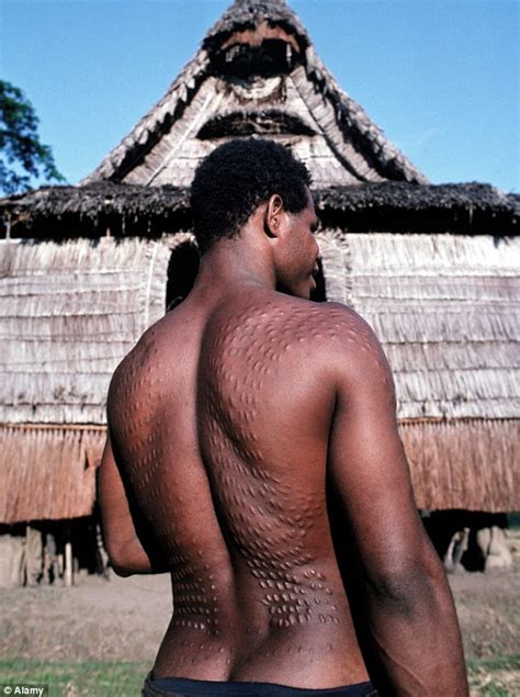 Papua New Guinea initiation ritual scars boys to look like crocodiles | Daily Mail Online