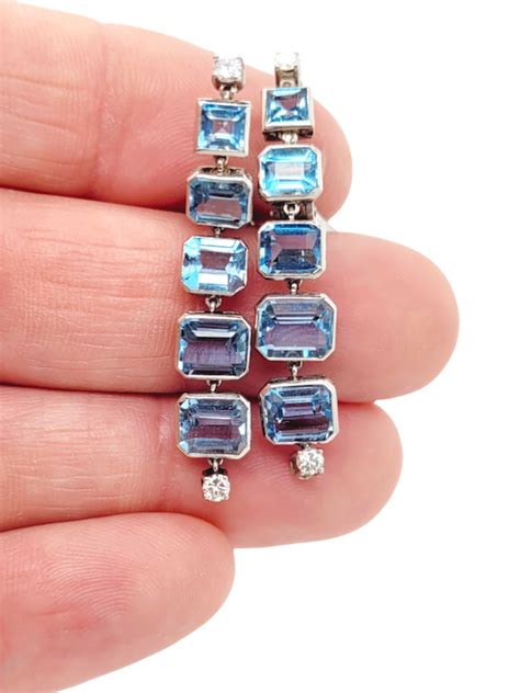 Pair of art deco aquamarine and diamond drop earrings SKU: 6941 DBGEMS