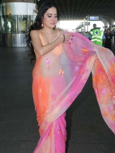 Urfi Javed saree struggles to stay in place due to heavy wind at the airport - PanAsiaBiz