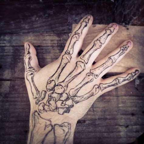 Halloween Hand | Skeleton hand tattoo, Bone hand tattoo, Hand tattoos