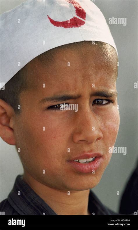 A boy in Red Cross procession Stock Photo - Alamy