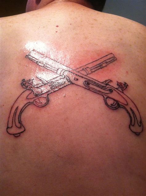 Crossed Pistols Tattoo