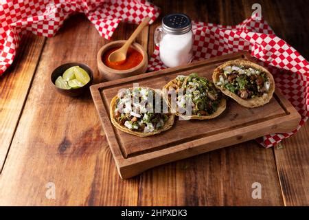 Tacos de Suadero. Fried meat in a corn tortilla. Street food from CDMX ...