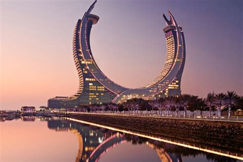 Inside Qatar's iconic crescent-shaped Raffles and Fairmont Doha - Arabian Business: Latest News ...