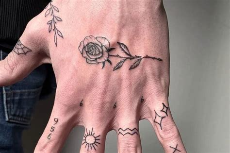 Update more than 76 rose hand tattoo with skeleton fingers latest - in.eteachers