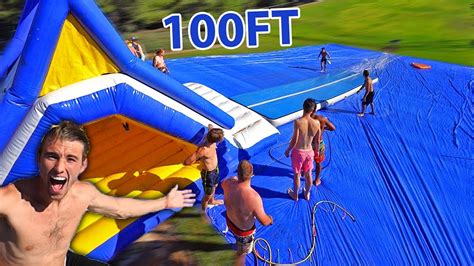 WORLDS LARGEST SLIP N SLIDE! *100FT* - YouTube