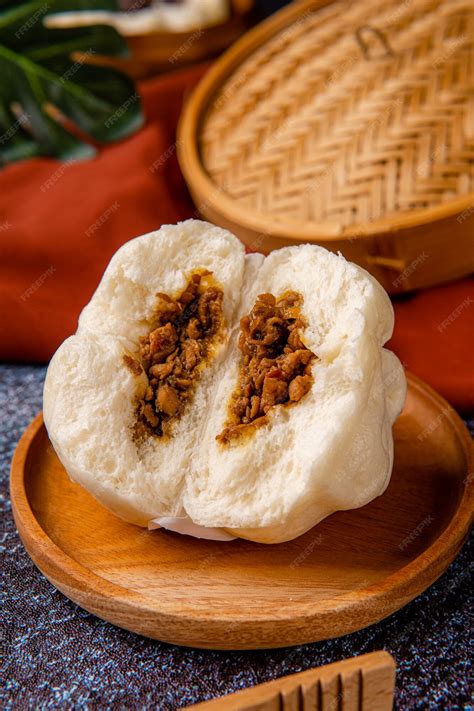 Premium Photo | Baozi or bakpao is a type of yeastleavened filled bun in various chinese ...