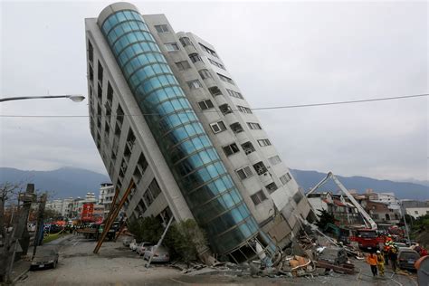 Taiwan earthquake photos: Firefighters rescue people from buildings leaning at precarious angles