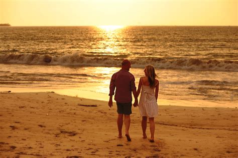 Free Images : hand, beach, sea, coast, sand, ocean, horizon, silhouette, sunset, sunlight ...