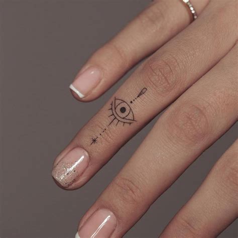 Discover 70+ small evil eye tattoo latest - in.coedo.com.vn