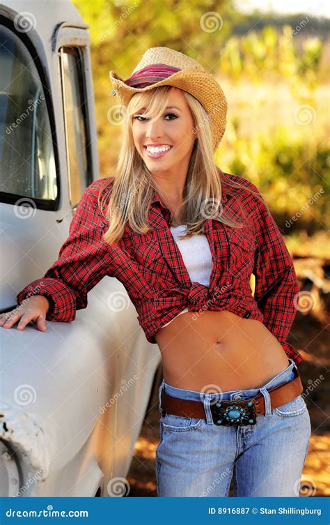 Blond Country Girl in Hat and Jeans Stock Image - Image of shadows, dukes: 8916887