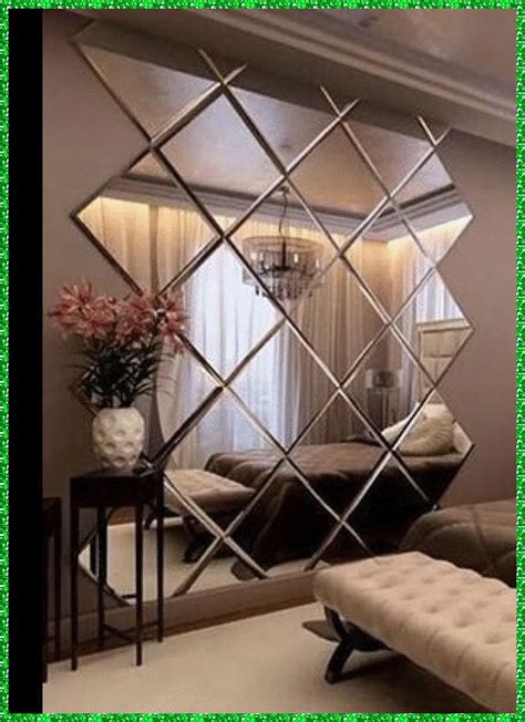 an image of a living room with mirrors on the wall and furniture in the background