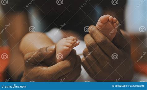 Black Father Playing with Baby Feet. Close Up Stock Photo - Image of feet, baby: 208225280