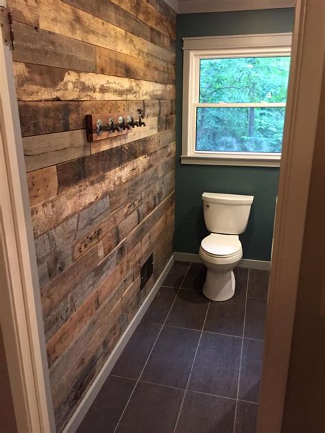 Bathroom accent wall from reclaimed barn wood. | Bathroom accent wall, Pallet wall bathroom ...