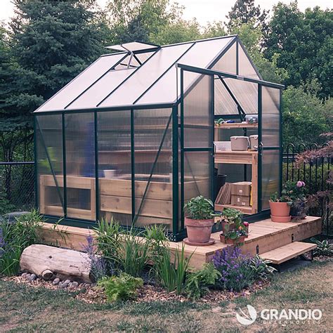 Grandio Ascent Greenhouse installed in Canada. This is a great example of installing on a wooden ...