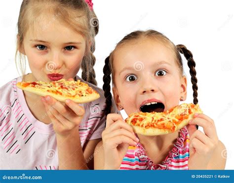 Girls eating pizza stock image. Image of lunch, circle - 20435221