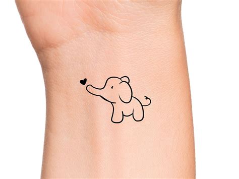 Baby Elephant Silhouette Tattoo