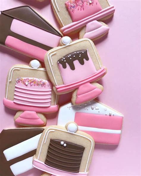 decorated cookies in the shape of toasters and cakes