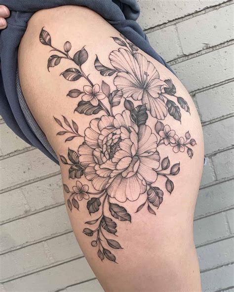 Flower thigh tattoo ideas photos